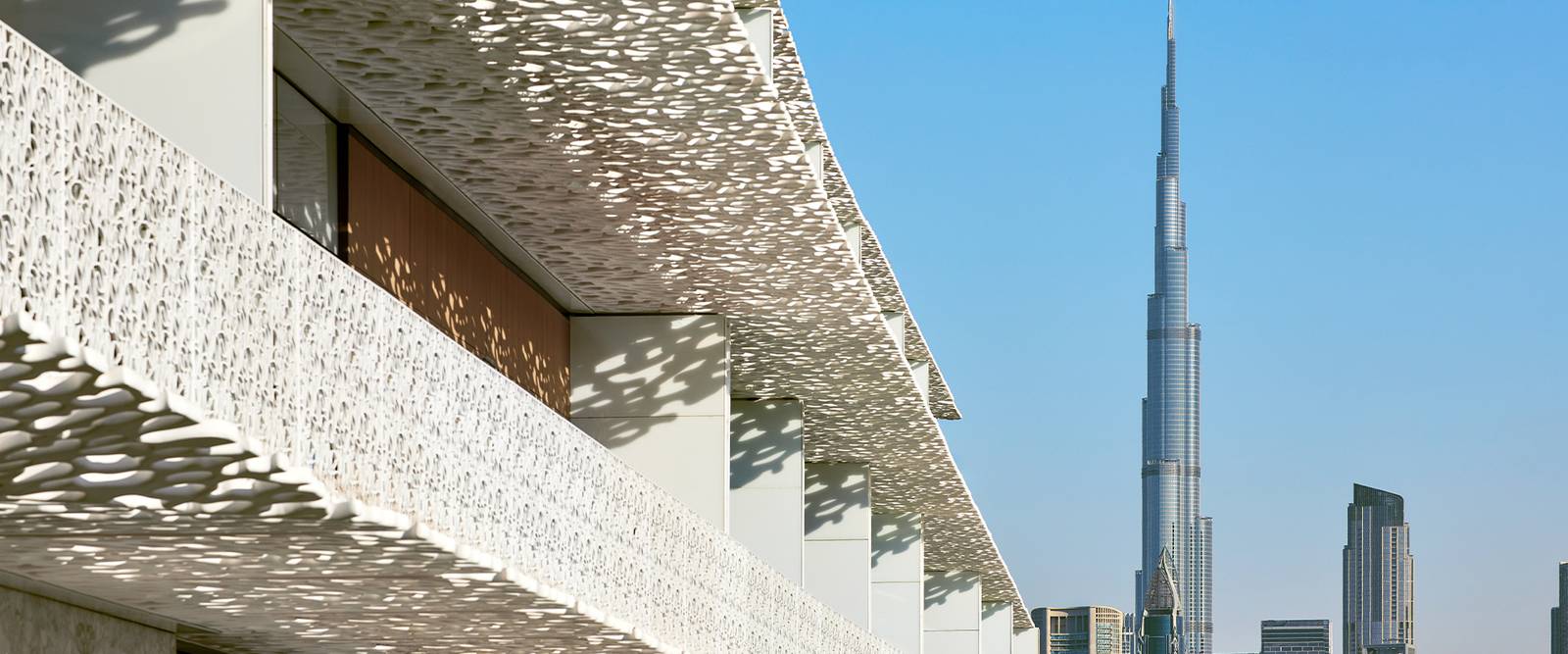 杜拜寶格麗度假村的鏤空石屏立面與哈里發塔