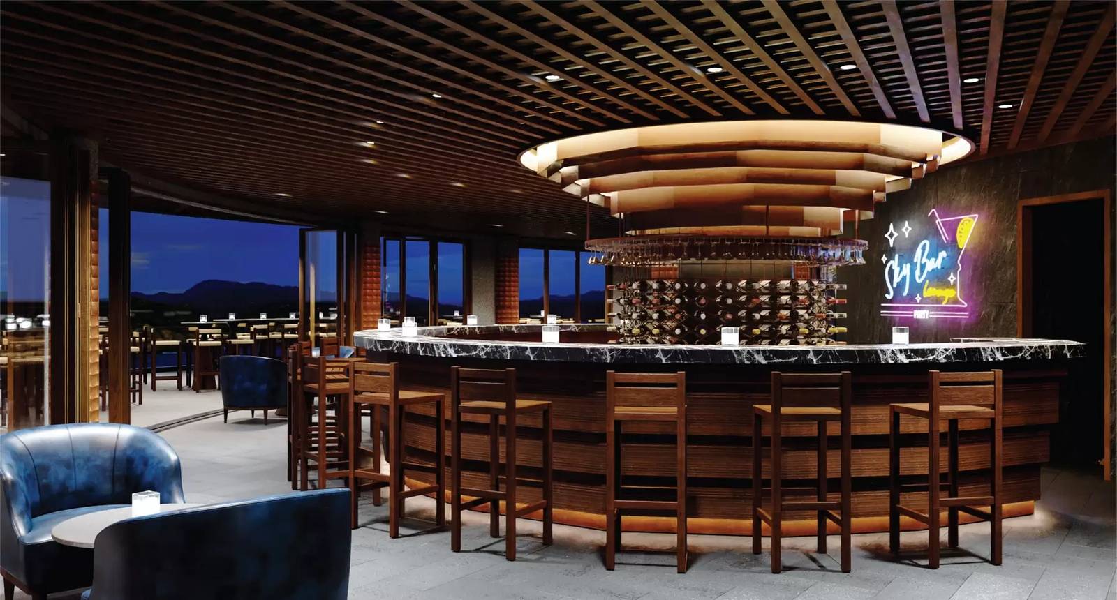 金蘭 Amiana 度假村 Sky Bar Lounge，圓形木質吧台、大理石檯面與霓虹招牌，後方為山影暮色
