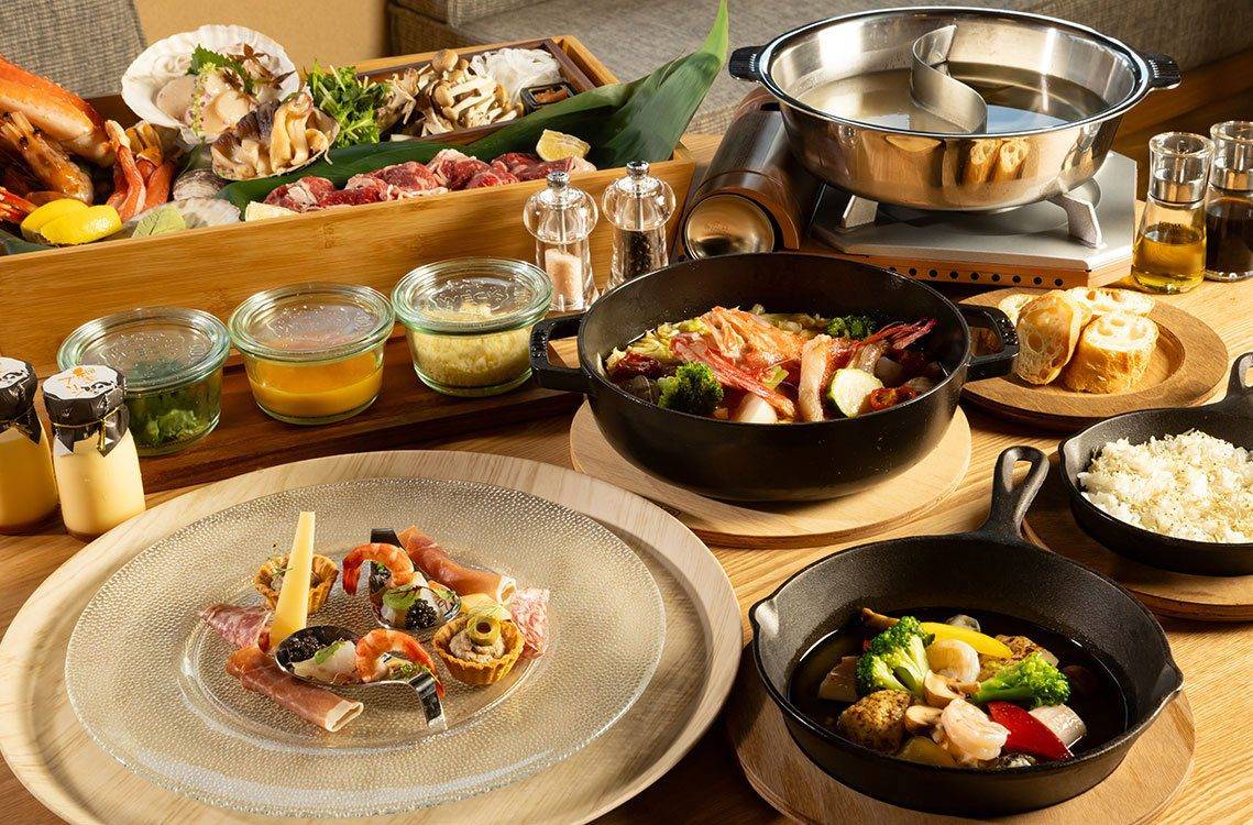 IZUBA 鑄鐵鍋料理、海鮮與前菜排滿一桌的晚餐