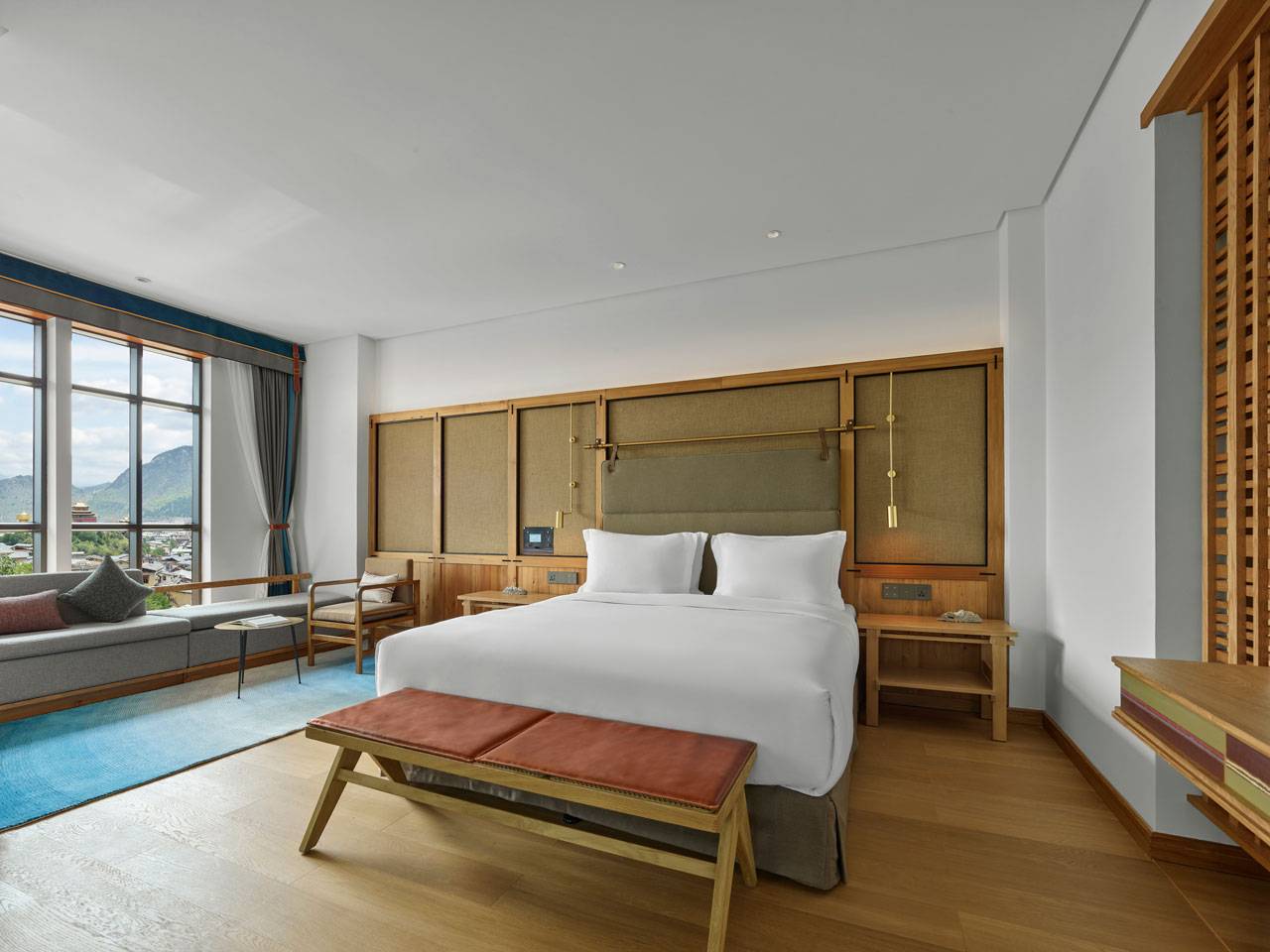 香格里拉 LUX* 酒店 LUX* Suite 的臥室與窗景