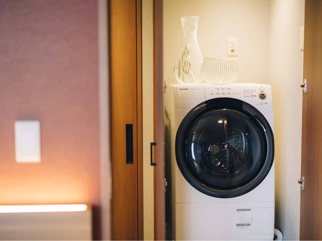 MIMARU SUITES 京都 四條 客房內的洗衣烘乾機